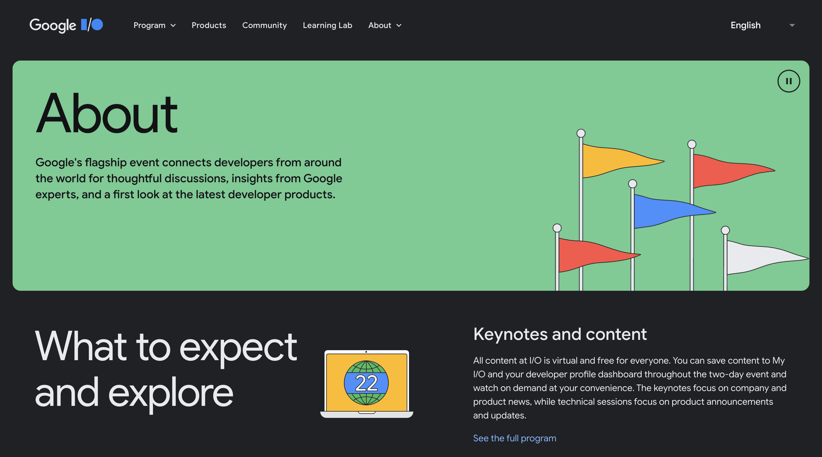 Screenshot of the Google I/O 2022 'About' page. The header contains the Google I/O logo, the main navigation, and a language selector. The hero section contains an introduction paragraph and an illustration of some plain flags blowing in the wind.